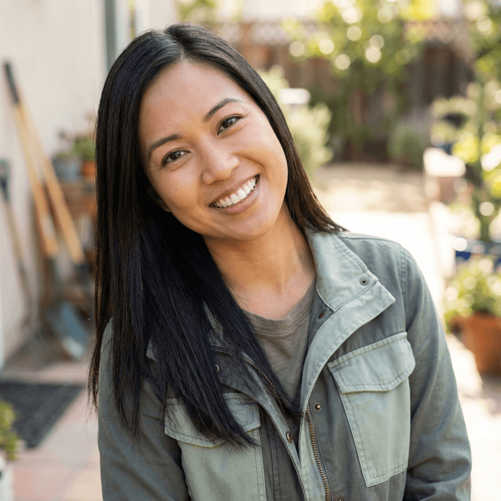 Emily Rodriguez, a homeowner, in her backyard in The Beaches neighborhood